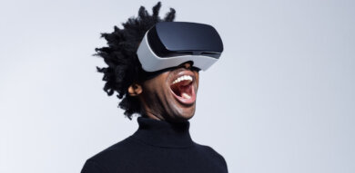 black man with VR headset with mouth open wow
