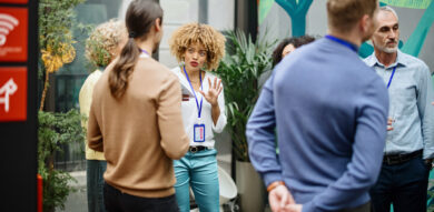 Multiethnic business people talk during a coffee break