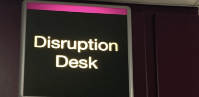 sign says Disruption Desk